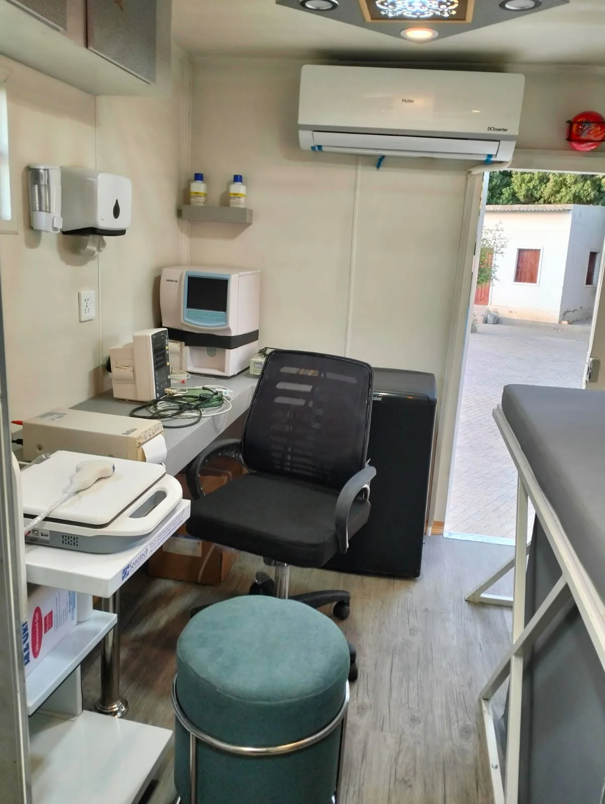 Clinical interior with a desk, seat and equipment